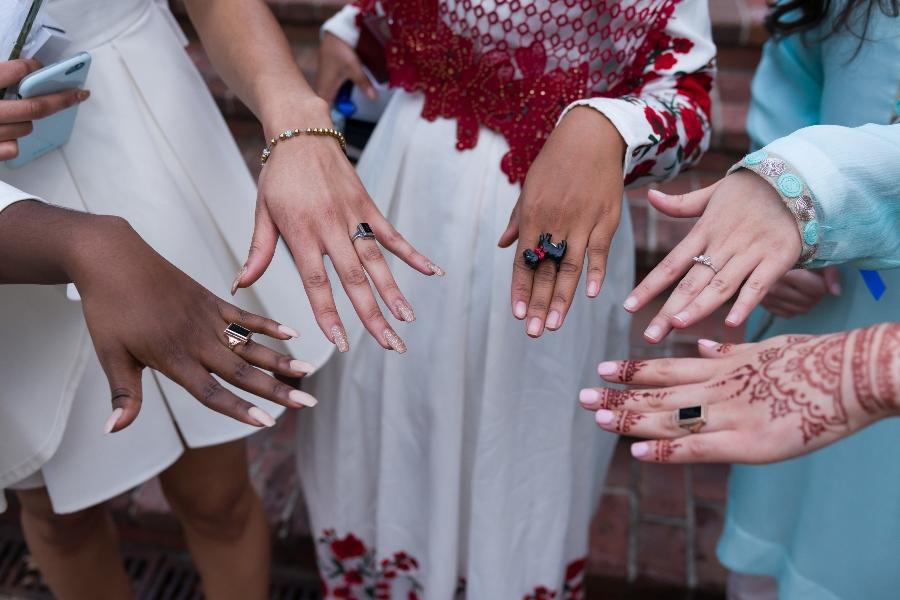 Students showing off their black onyx rings.